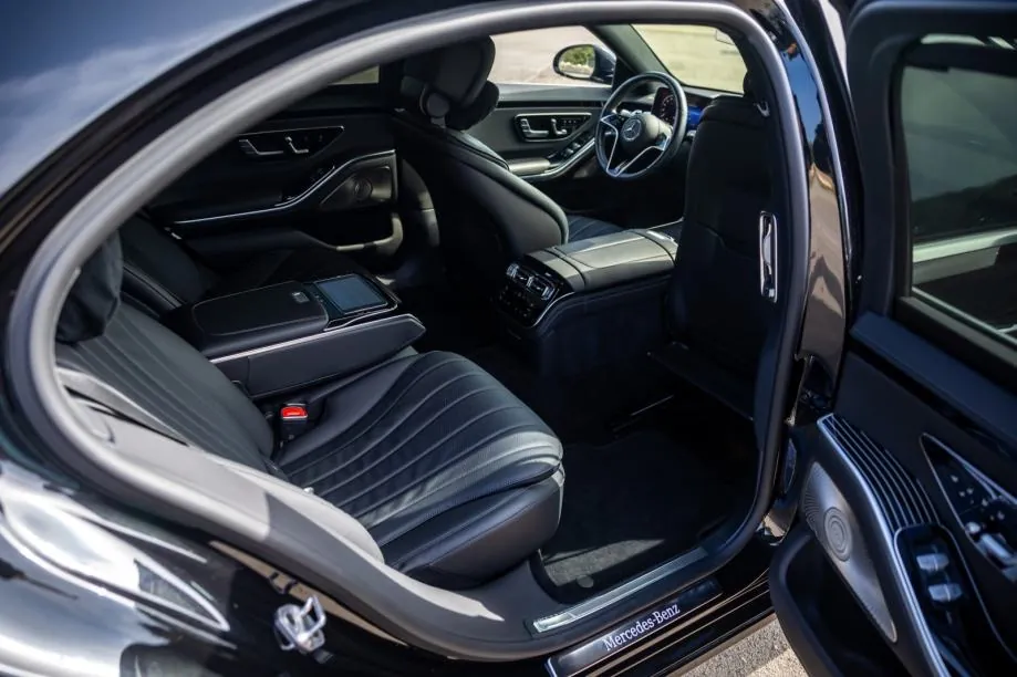 Black leather rear seats of the S-Class seen through the open door